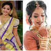 Elegant Gajra Bun styling On Yellow Saree  Aishwarya Lekshmi
