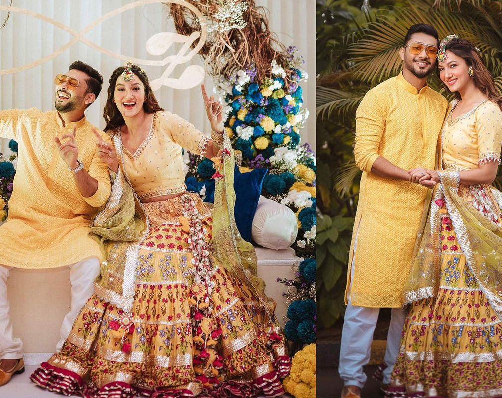 
Gauahar Khan and Zaid Darbar share pictures from their first pre-wedding ritual 'Chiksa' as they twin in yellow
