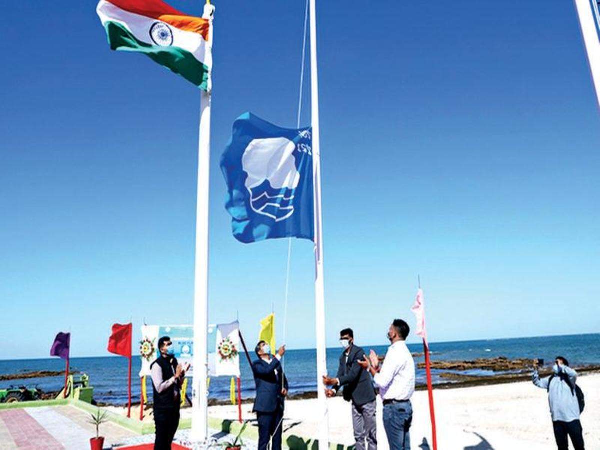 Blue flag flutters high in Shivrajpur beach | Rajkot News - Times of India