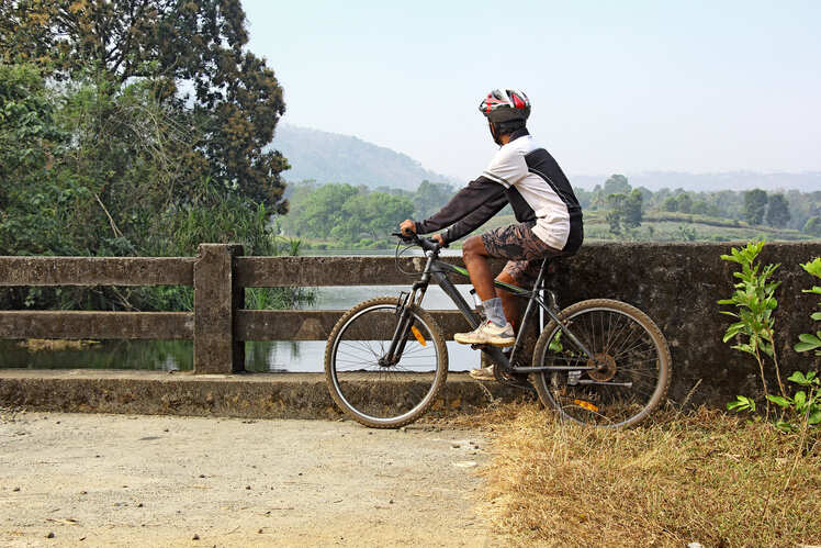 On a bicycle or a motorbike