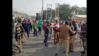 Rajasthan-Haryana border: Cops use water cannon, tear gas as farmers break through barricades