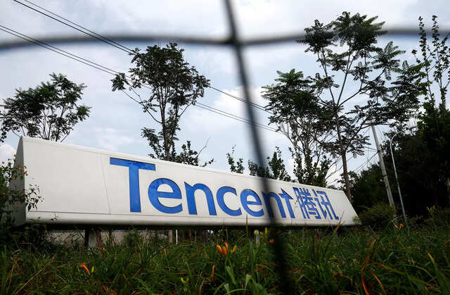 A logo of Chinese tech firm Tencent, owner of messaging app WeChat, is pictured in Beijing, China August 7, 2020. REUTERS/Thomas Peter/File Photo