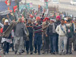 Farmers continue protest amid rain, cold