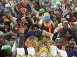 Farmers continue protest amid rain, cold