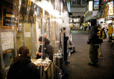 Tokyo daily coronavirus cases hit record as state of emergency looms