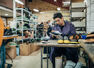 Why is India lagging behind China in footwear production?