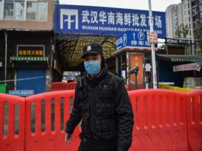 China says WHO experts to visit Wuhan in virus origins probe