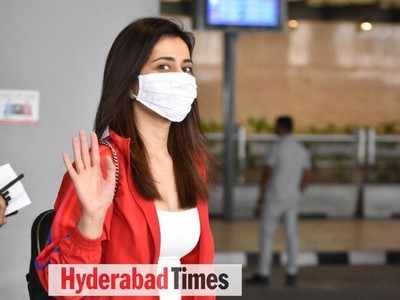 Spotted: Raashi Khanna is a vision in bright red as she arrives in Hyderabad