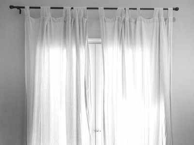 Metallic curtain rods for stylish window dressing