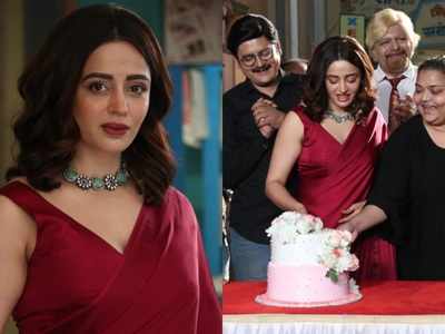 Nehha Pendse looks lovely as the new Anita bhabhi in a red saree; cuts a welcome cake on the sets of Bhabiji Ghar Par Hai