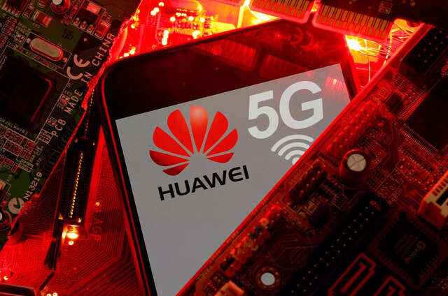 A smartphone with the Huawei and 5G network logo is seen on a PC motherboard in this illustration picture taken January 29, 2020. REUTERS/Dado Ruvic/File Photo A smartphone with the Huawei and 5G network logo is seen on a PC motherboard in this illustration picture taken January 29, 2020. REUTERS/Dado Ruvic/File Photo