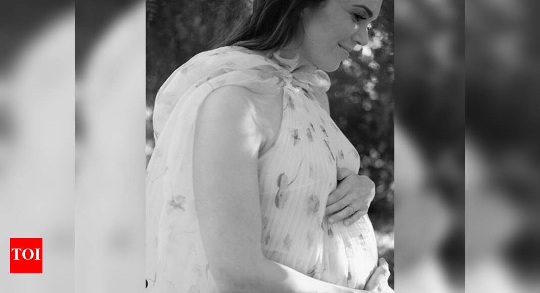 Mandy Moore shares new baby bump photo from maternity shoot English