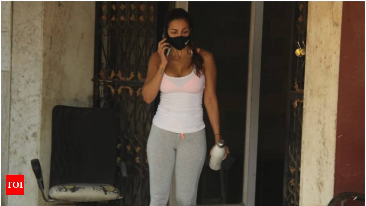 Malaika Arora Looks Uber Cool In Yoga Pants, Crop Top; Netizen