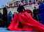 Lady Gaga's fashion statement: Dove-shaped bird and billowing red sculpted skirt