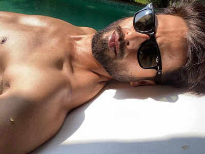 Shahid Kapoor serves a shirtless selfie from Goa and captions it, “Sunny side up”