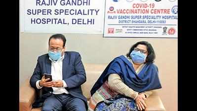 Delhi: Doctor couple who battled Covid leads by example to take shots