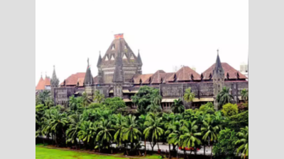 Holding girl's hands, opening pant's zip no sexual assault under POCSO: Bombay HC