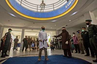 2 men caned 77 times for having sex in Indonesia's Aceh