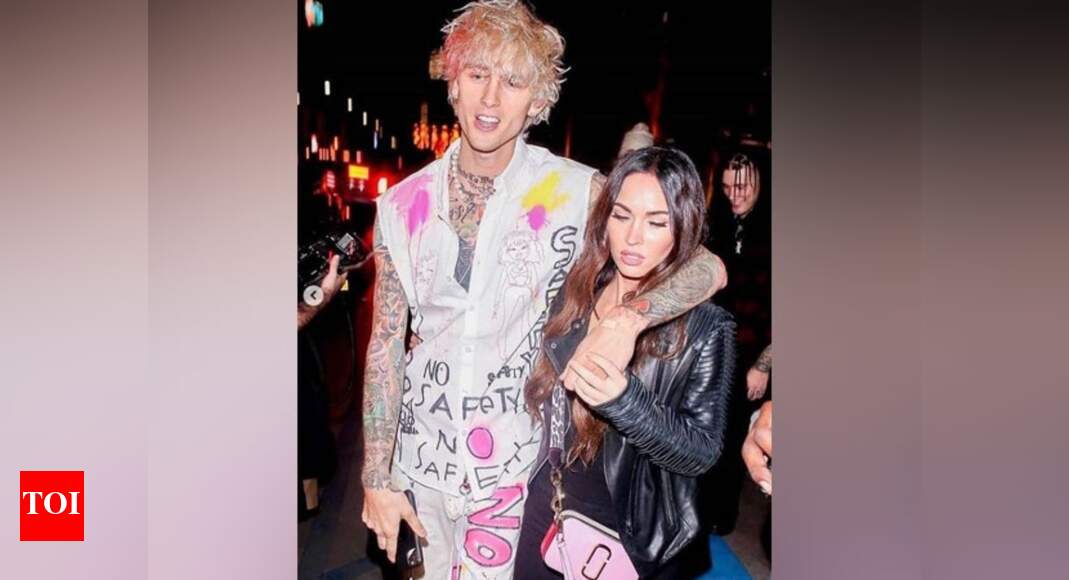 Megan fox sparks engagement rumours with machine gun kelly | english movie news - times of india