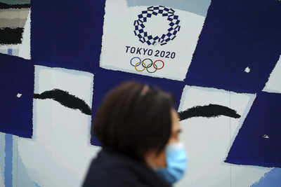 Japan to extend virus emergency, months before delayed Olympics