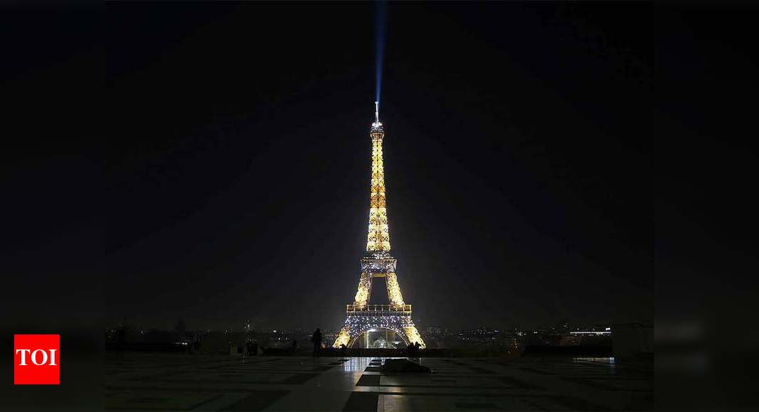 Going For Gold Eiffel Tower Gets Olympic Facelift More Sports News Times Of India