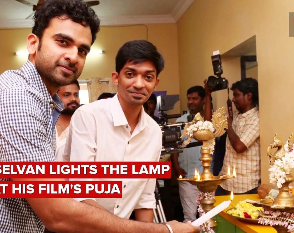 
Ashok Selvan lights the lamp at his film's puja
