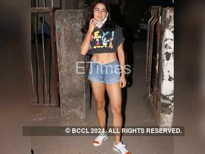 Photos: Sara Ali Khan flaunts her washboard abs in a crop top and denim as she gets snapped post her visit to a salon