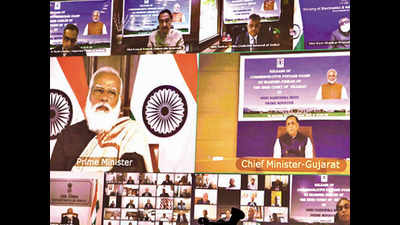 PM Narendra Modi releases postage stamp on Gujarat HC’s diamond jubilee