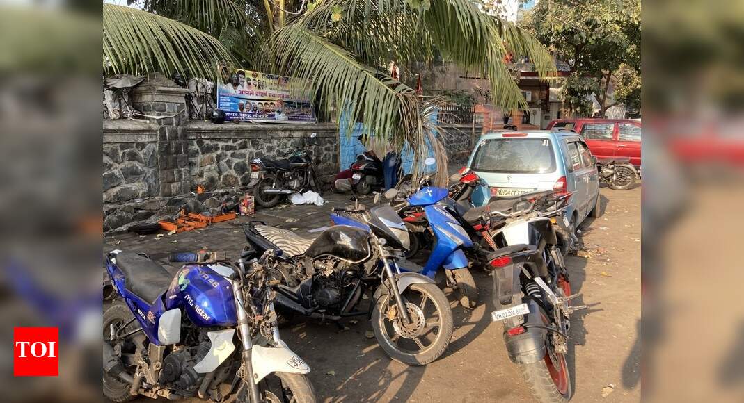 Footpath encroached - Times of India