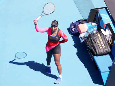 Australian Open: Serena Williams sees off Nina Stojanovic to sweep into third round