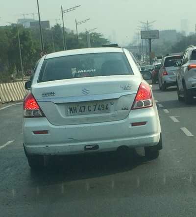 MERU Taxi with White Number plate - Times of India