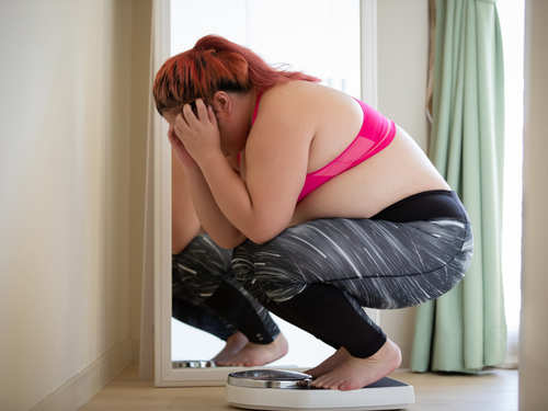 The number of times you should weigh yourself to lose weight - Times of  India