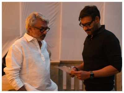 Ajay Devgn all smiles as he reunites with Sanjay Leela Bhansali on sets after 22 years!