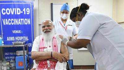 PM Narendra Modi takes first dose of Covid-19 vaccine at Delhi's AIIMS