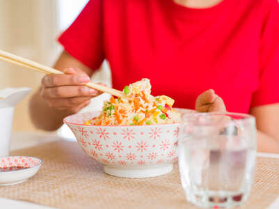 Is it okay to drink water with meals?
