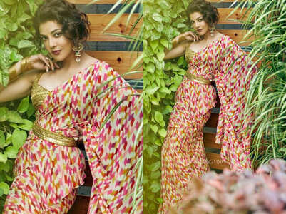 Kajal Aggarwal paired a printed sari with golden belt