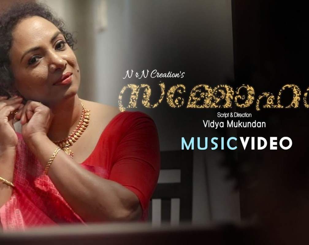 
Check Out Latest Malayalam Song Music Video - 'Sammohanam' Sung By Vijesh Gopal Featuring Vidya Mukundan And Suresh Menon
