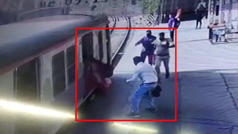On cam: Railway guard, RPF personnel save woman from falling off moving ...