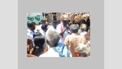 Video shows AIADMK candidate Natham R Vishwanathan distributing money to voters