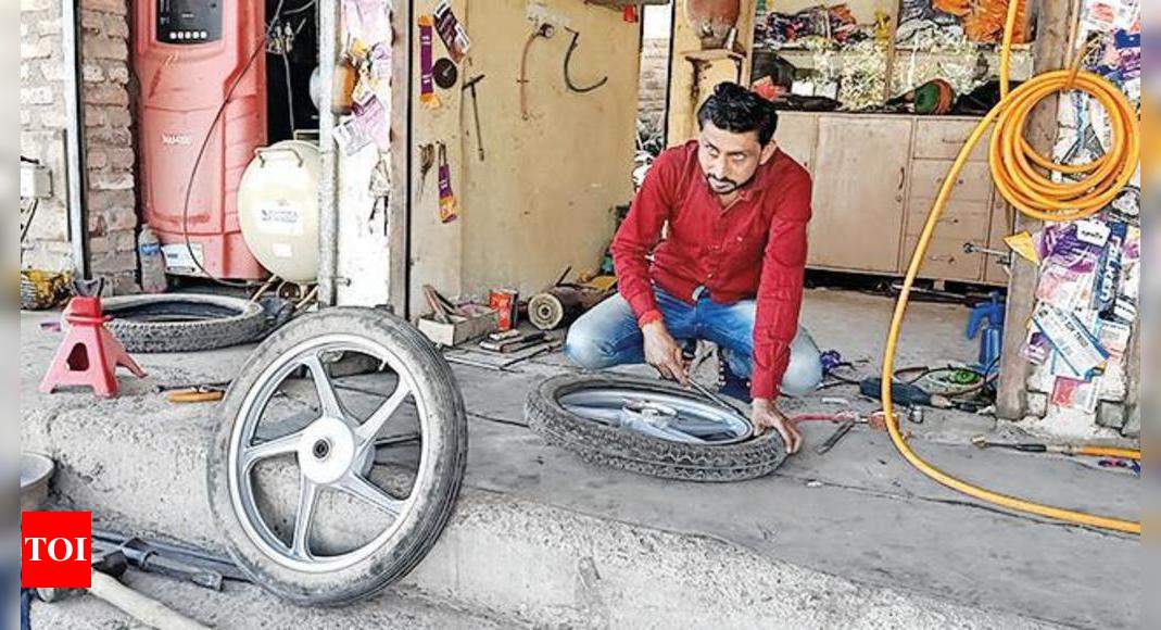 Puncture repairer pedals to top post Rajkot News Times of India