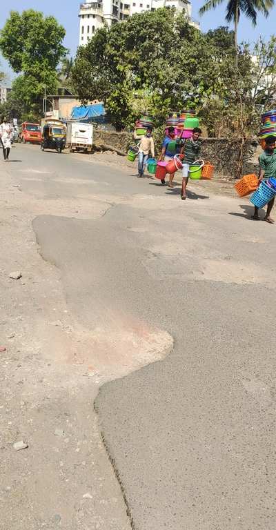 Pothole Road like Moon on DP Road at Borivali East