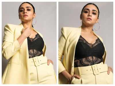 Amruta Khanvilkar gives out major boss lady vibes in THIS yellow pantsuit; see pics