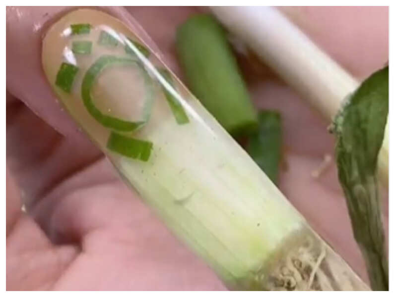 Viral: Woman using spring onion for a nail art is breaking the internet