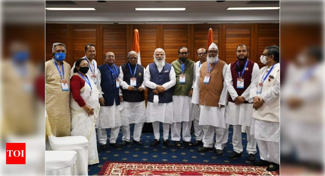 PM Modi meets political and community leaders in Bangladesh – Times of India
