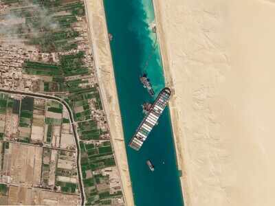 Race To Free Giant Ship From Suez Canal Continues
