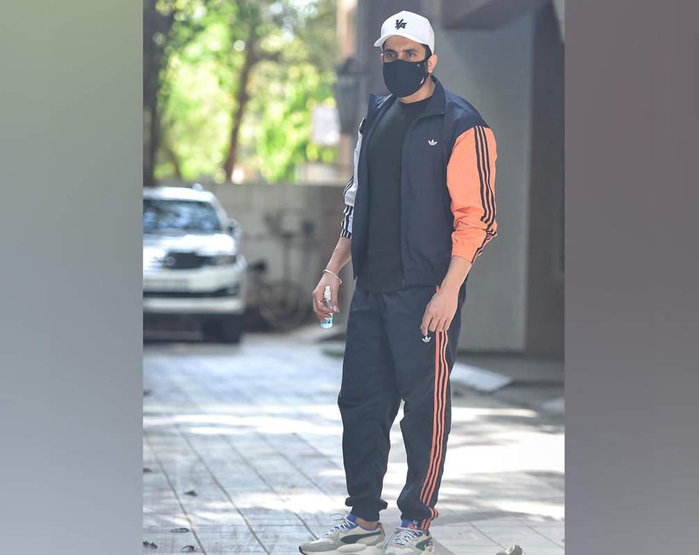 
Sunny Singh carries a hand sanitiser during his outing in Juhu
