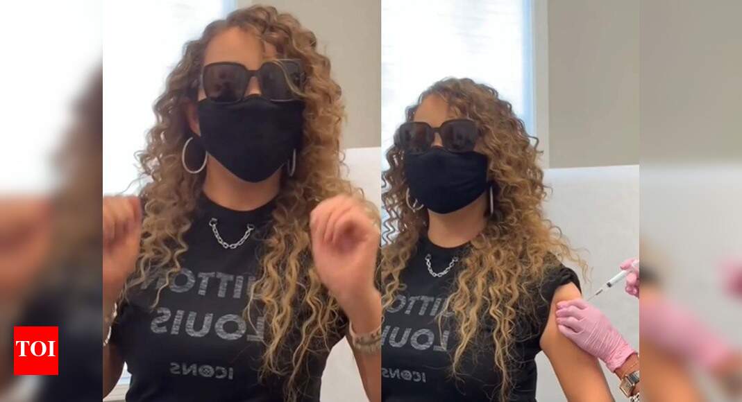 Mariah Carey hits high note while getting first dose of COVID19