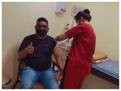 Bhau Kadam takes the first dose of the COVID-19 vaccine