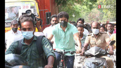 Vijay arrives on a bicycle to register his vote in TN Elections