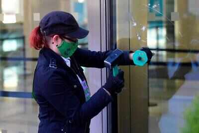 Climate change protesters break windows at Barclays London HQ - Times ...